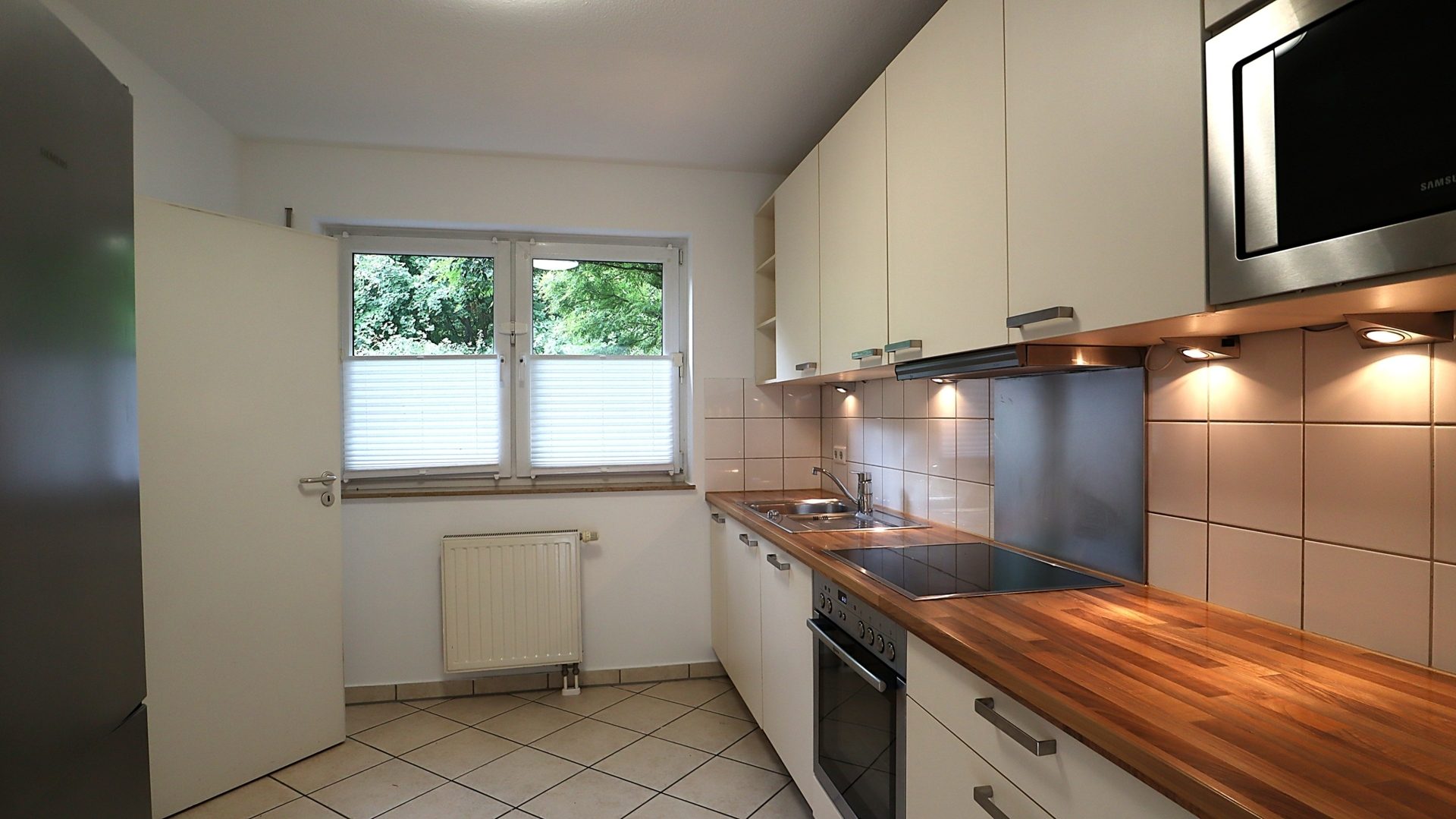 Böcker Wohnimmobilien - Immobilienangebot - Düsseldorf / Einbrungen - Alle - Attraktives Reihenmittelhaus in Einbrungen mit Garten