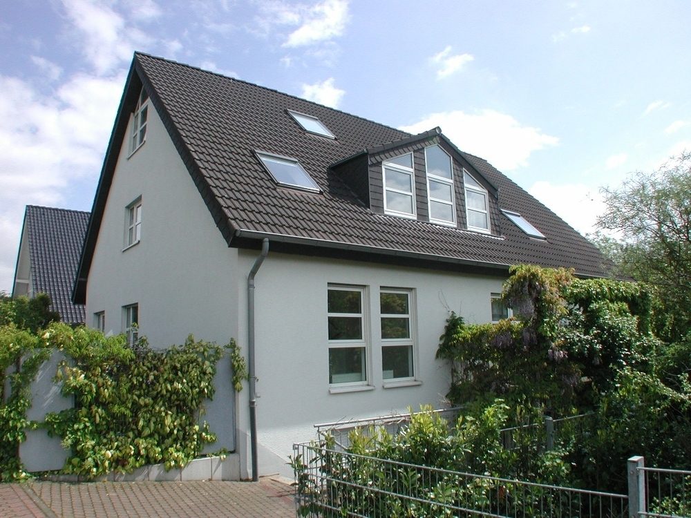 Böcker Wohnimmobilien - Immobilienangebot - Düsseldorf / Wittlaer - Alle - Hochwertiges Split-Level-Haus in bevorzugter Lage von Wittlaer
