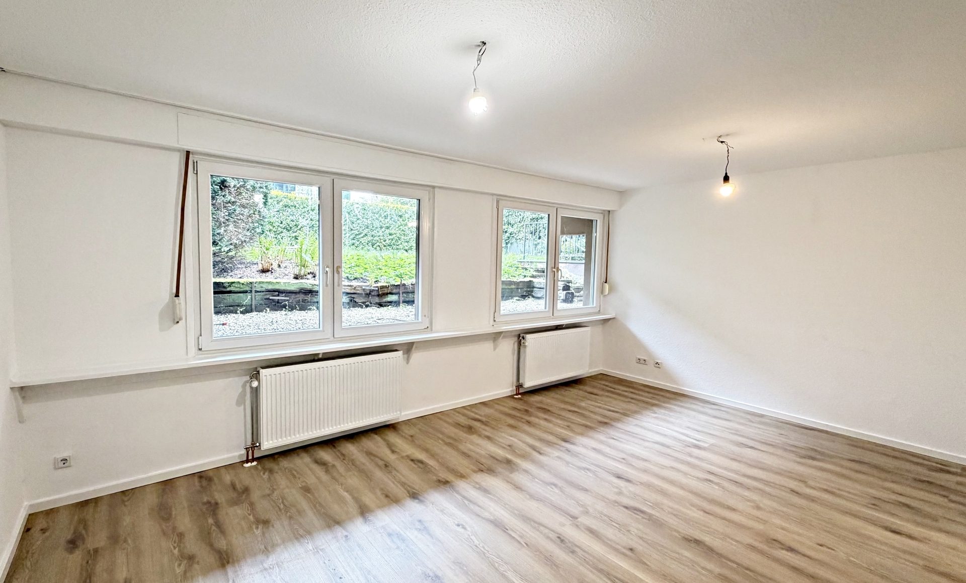 Böcker Wohnimmobilien - Immobilienangebot - Düsseldorf / Niederkassel - Alle - Attraktive Wohnkombination: Familienwohnung mit modernisiertem Studio & Garage