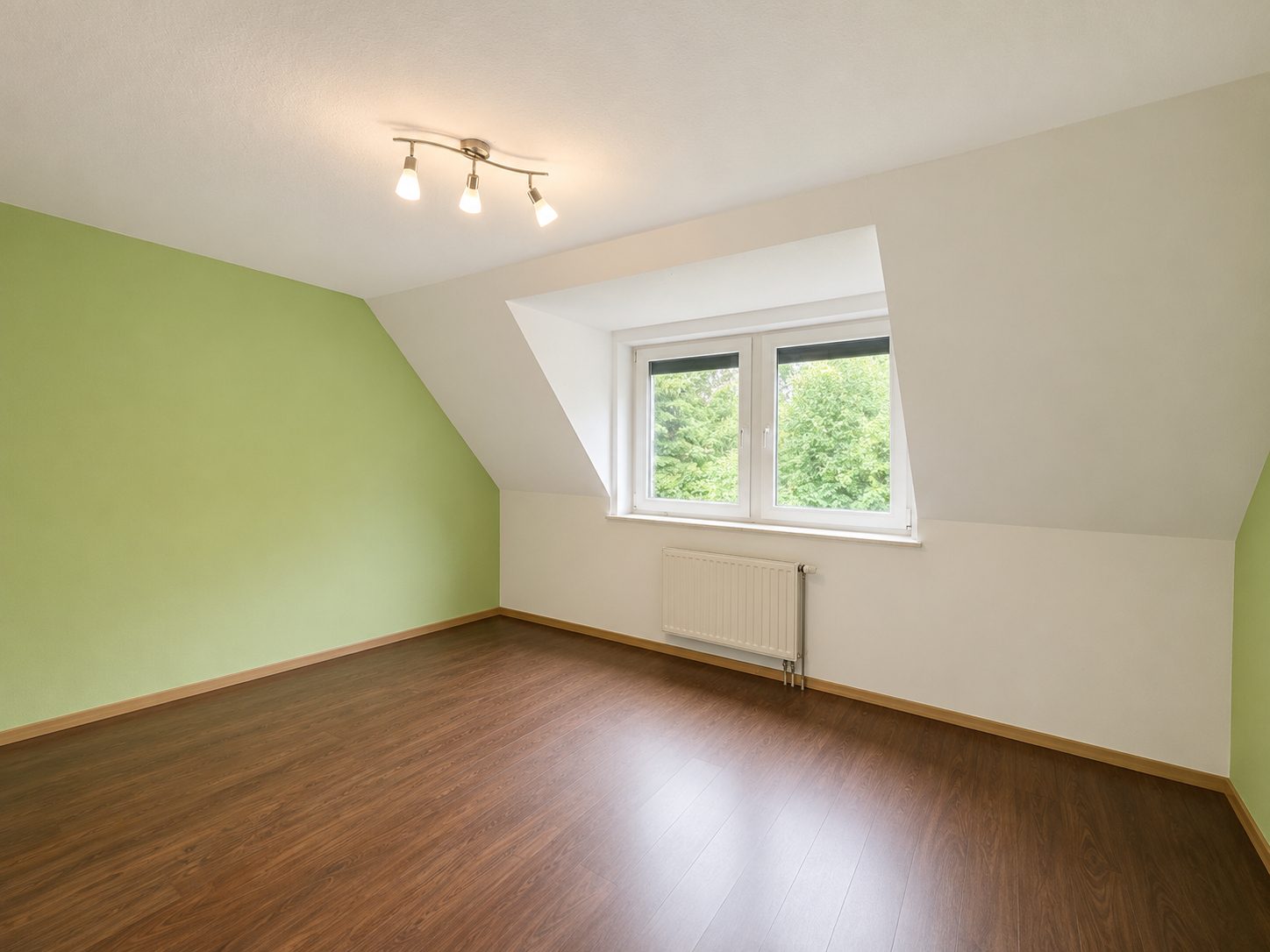 Böcker Wohnimmobilien - Immobilienangebot - Düsseldorf - Alle - Familienfreundliches Reihenhaus mit sonnigem Garten und ganzjährigem Grünblick
