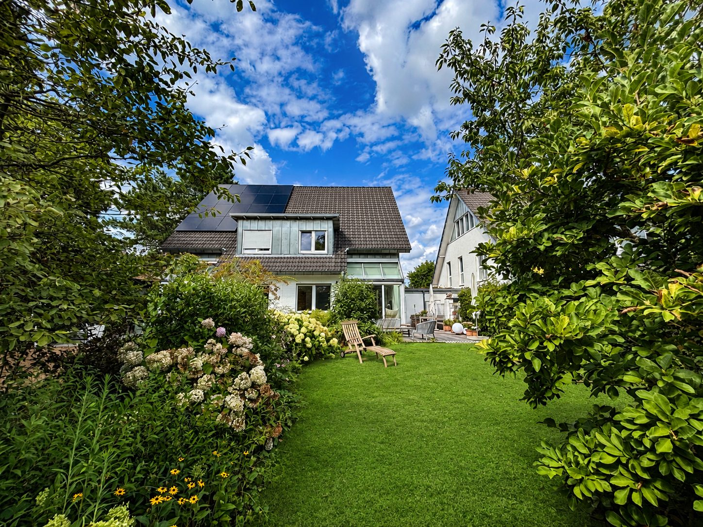 Böcker Wohnimmobilien - Immobilienangebot - Düsseldorf /Angermund - Alle - Hochwertige Doppelhaushälfte mit großem Garten und flexiblem Raumkonzept