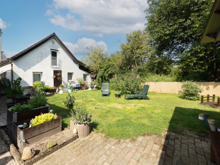 Immobilienangebot - Hasbergen - Alle - Vielseitige Doppelhaushälfte mit zwei Wohneinheiten – mitten in Hasbergen!