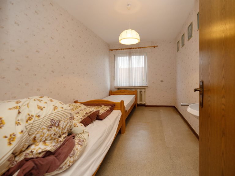 Immobilienangebot - Alfhausen - Alle - Großzügiges Einfamilienhaus auf sonnigem Grundstück mit Bauplatz für zukünftige Projekte!