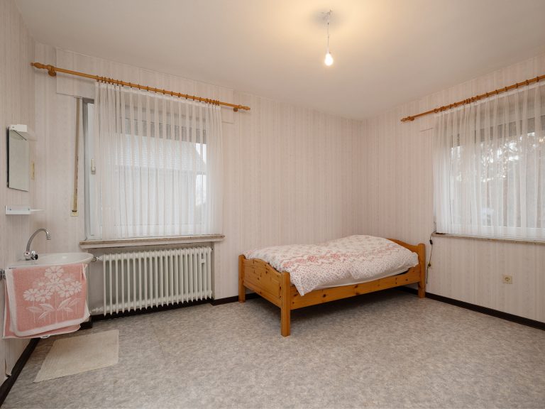 Immobilienangebot - Alfhausen - Alle - Großzügiges Einfamilienhaus auf sonnigem Grundstück mit Bauplatz für zukünftige Projekte!