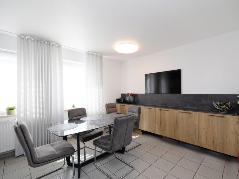 Immobilienangebot - Holdorf - Alle - Attraktives Mehrfamilienhaus mit 8 Wohneinheiten - Kapitalanlage mit Potenzial in Holdorf!