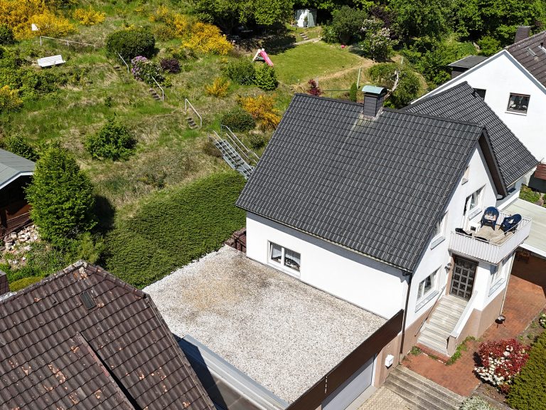 Immobilienangebot - Hiddenhausen - Alle - Wohnen mit Aussicht: Charmantes Einfamilienhaus in ruhiger Höhenlage von Hiddenhausen