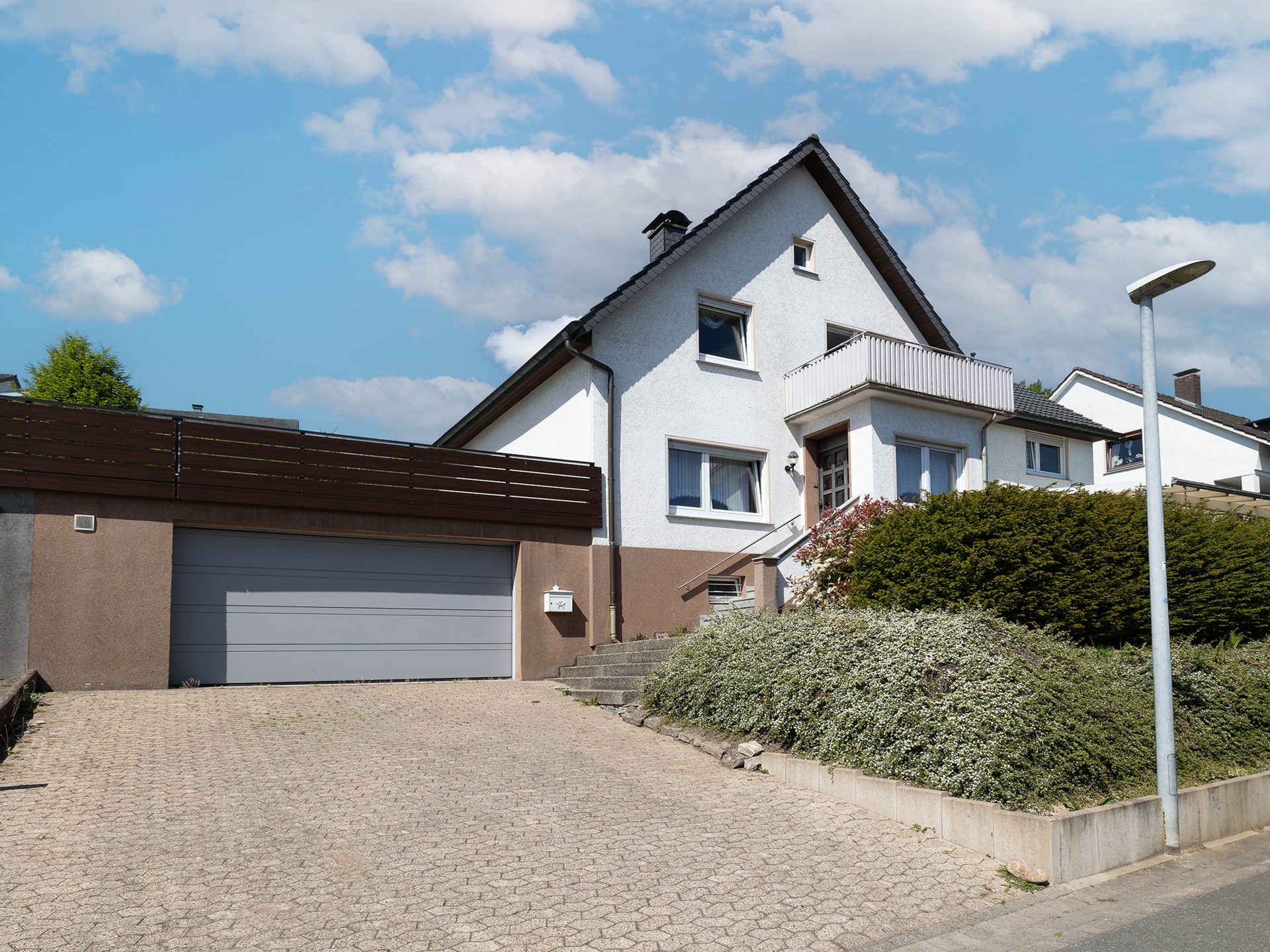 Immobilienangebot - Hiddenhausen - Alle - Wohnen mit Aussicht: Charmantes Einfamilienhaus in ruhiger Höhenlage von Hiddenhausen