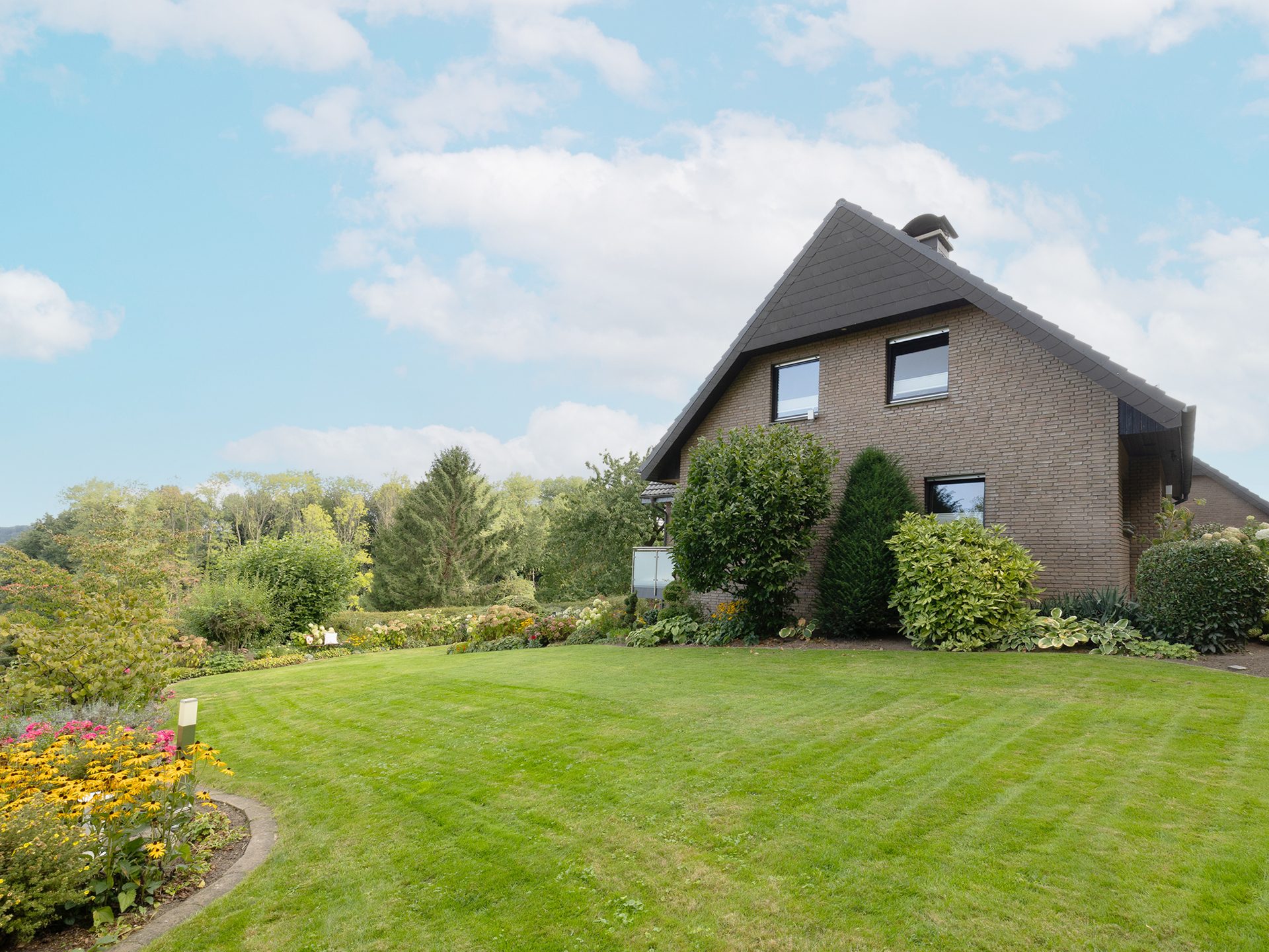 Immobilienangebot - Hilter am Teutoburger Wald - Alle - Großzügiges Einfamilienhaus trifft auf ruhige Waldrandlage in Hilter