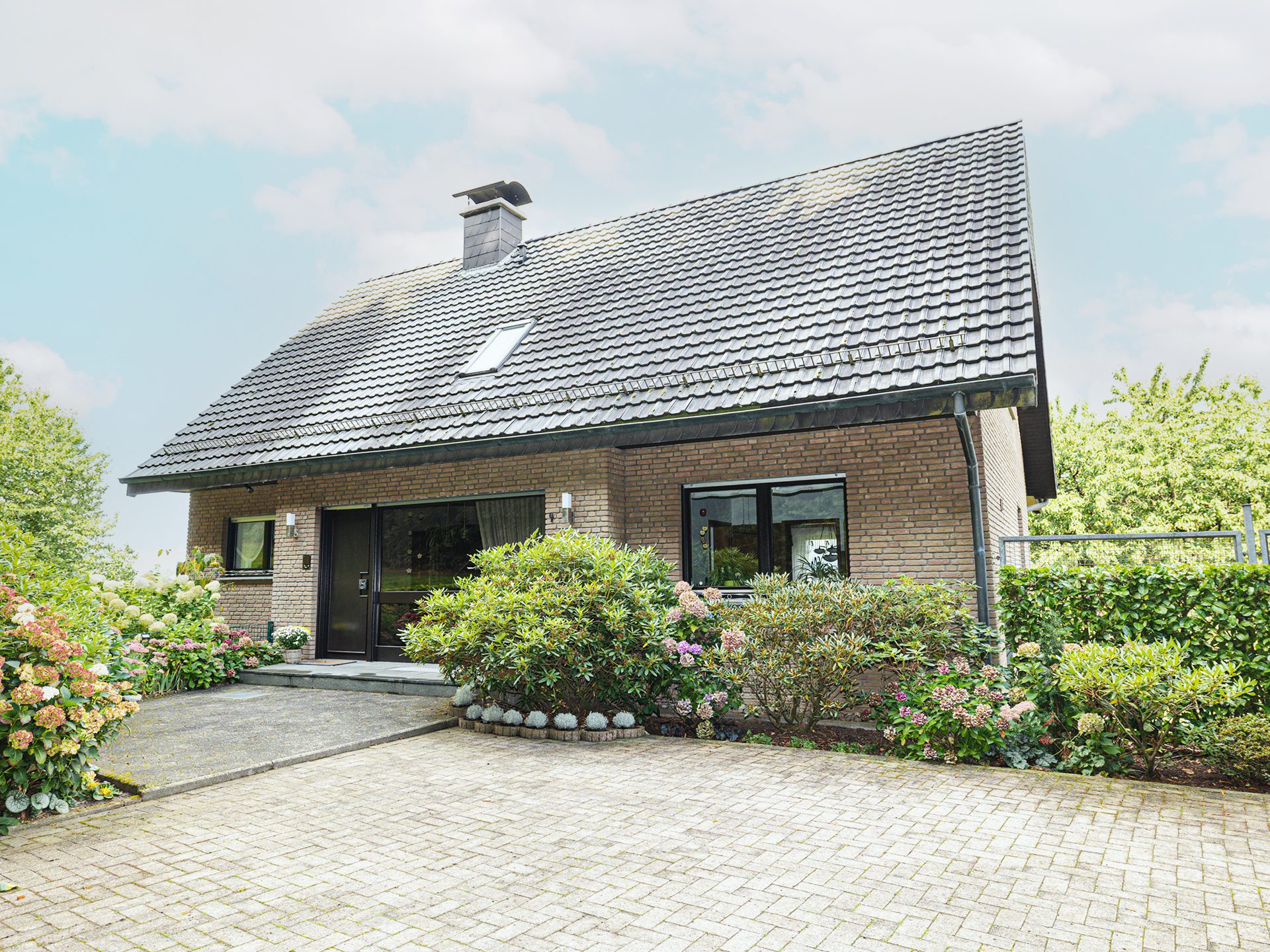 Immobilienangebot - Hilter am Teutoburger Wald - Alle - Großzügiges Einfamilienhaus trifft auf ruhige Waldrandlage in Hilter
