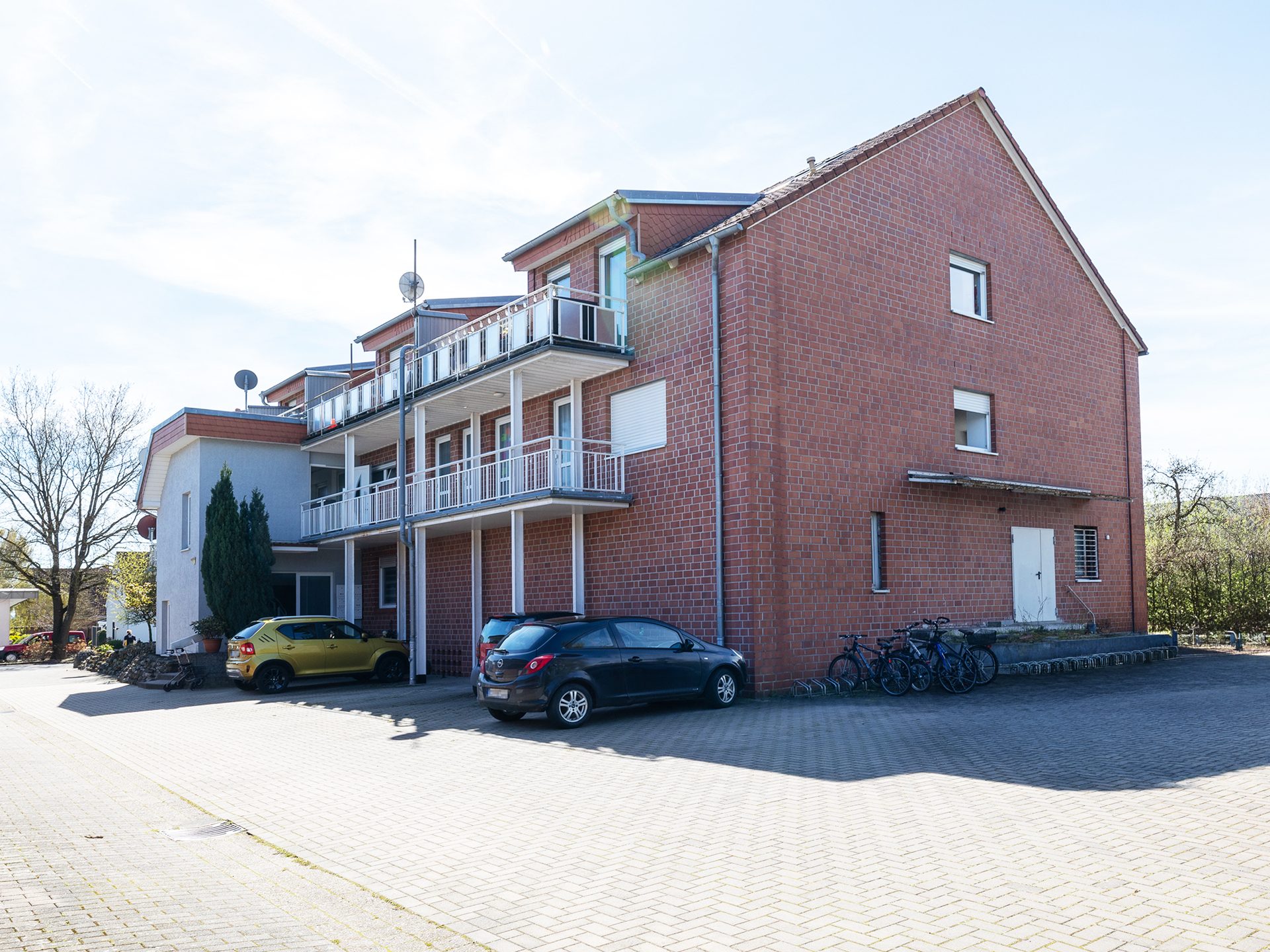Immobilienangebot - Melle / Neuenkirchen - Alle - Vollvermietetes Renditeobjekt: 12 Wohneinheiten und eine Lagerhalle in Melle-Neuenkirchen!