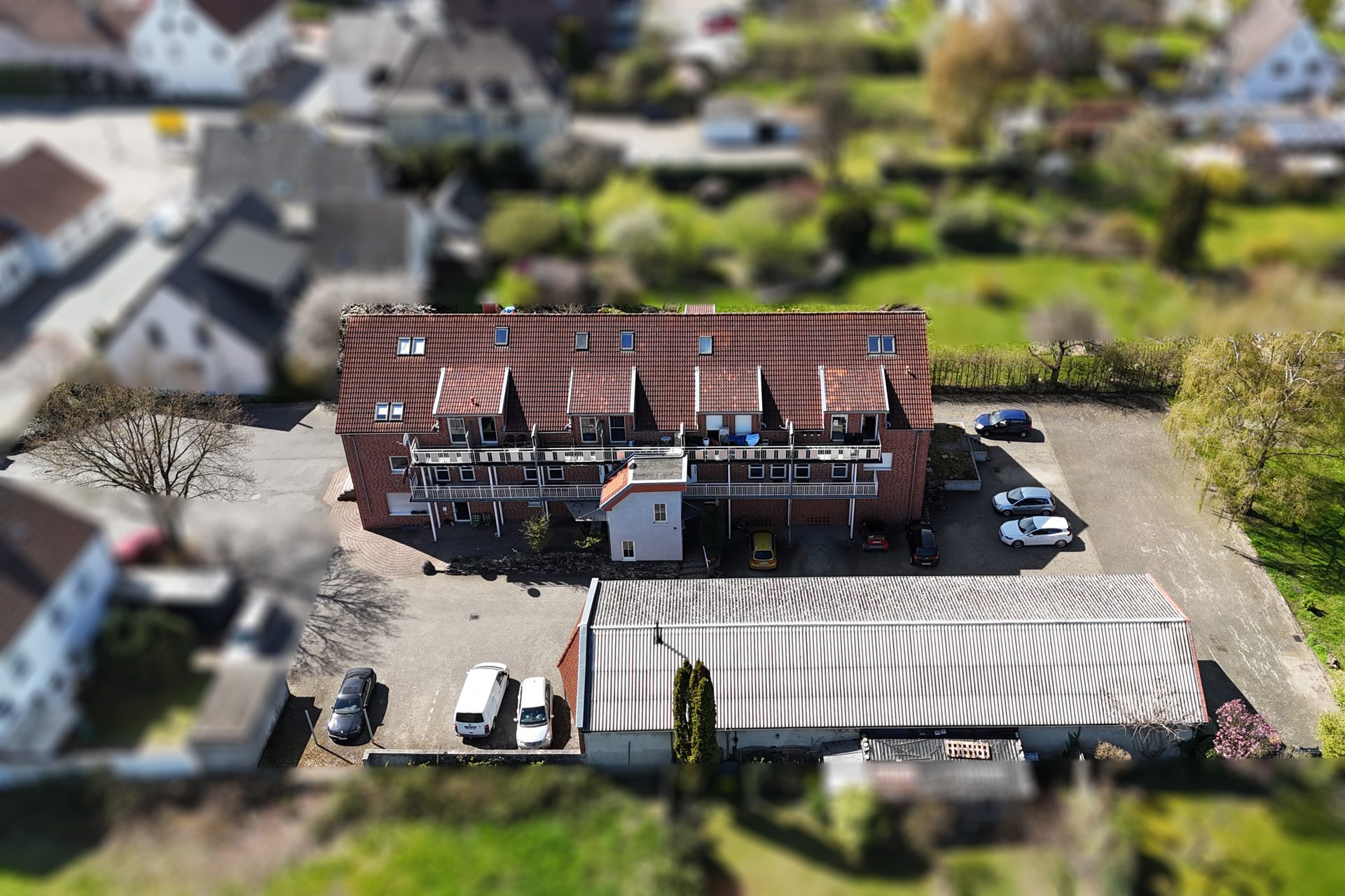 Immobilienangebot - Melle / Neuenkirchen - Alle - Vollvermietetes Renditeobjekt: 12 Wohneinheiten und eine Lagerhalle in Melle-Neuenkirchen!