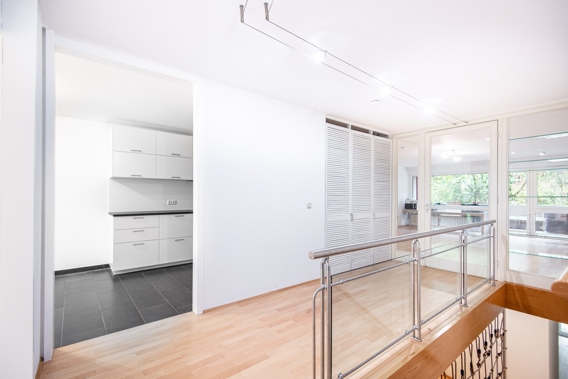 Aigner Immobilien GmbH - Immobilienangebot - 80809 München - Schwabing-West - Maisonettewohnung - Absolute Besonderheit: Wohnen auf zwei Etagen mit Garten und Balkon direkt am Olympiapark!
