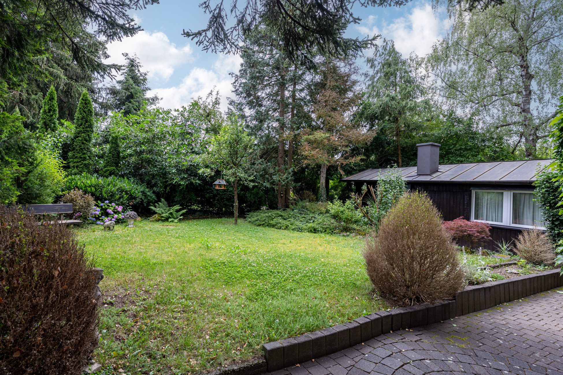 Aigner Immobilien GmbH - Immobilienangebot - 81377 München - Hadern - Einfamilienhaus - Ruhig gelegenes Einfamilienhaus mit großzügigem Garten in Hadern