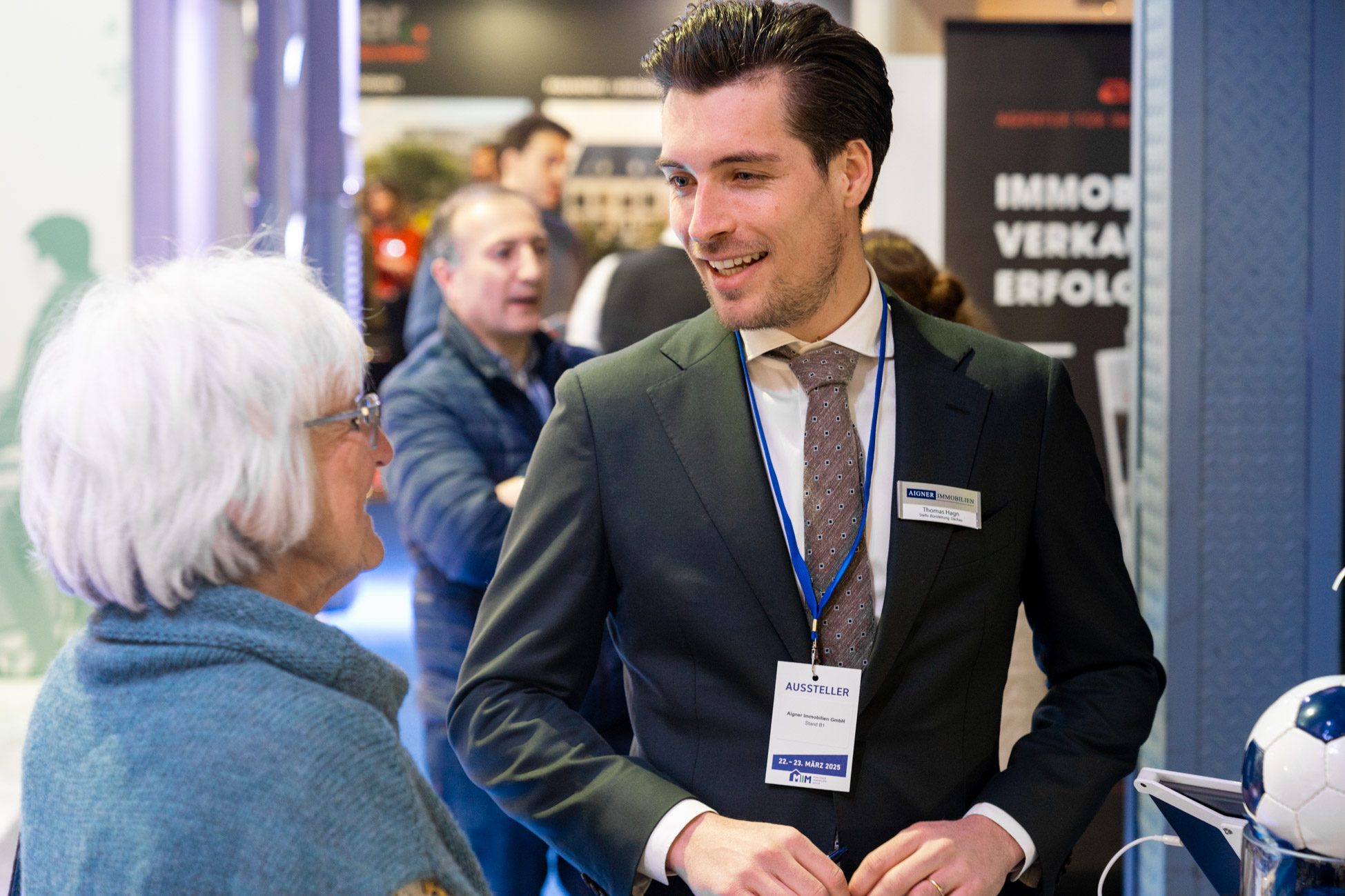 Tom Hagn Immobilienmakler bei Aigner Immobilien auf der münchner immobilienmesse