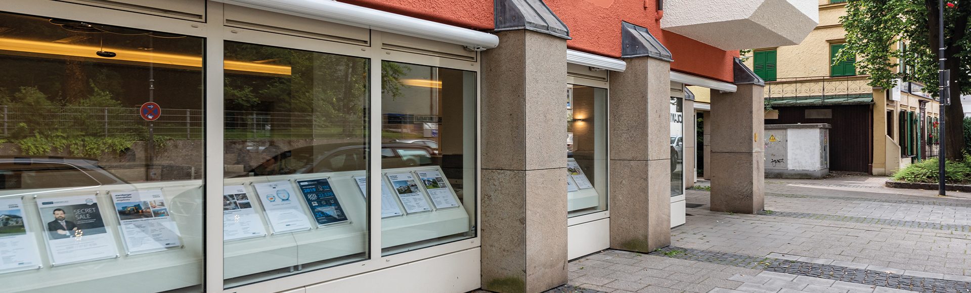 Fassade Aigner Immobilien Büro in Starnberg