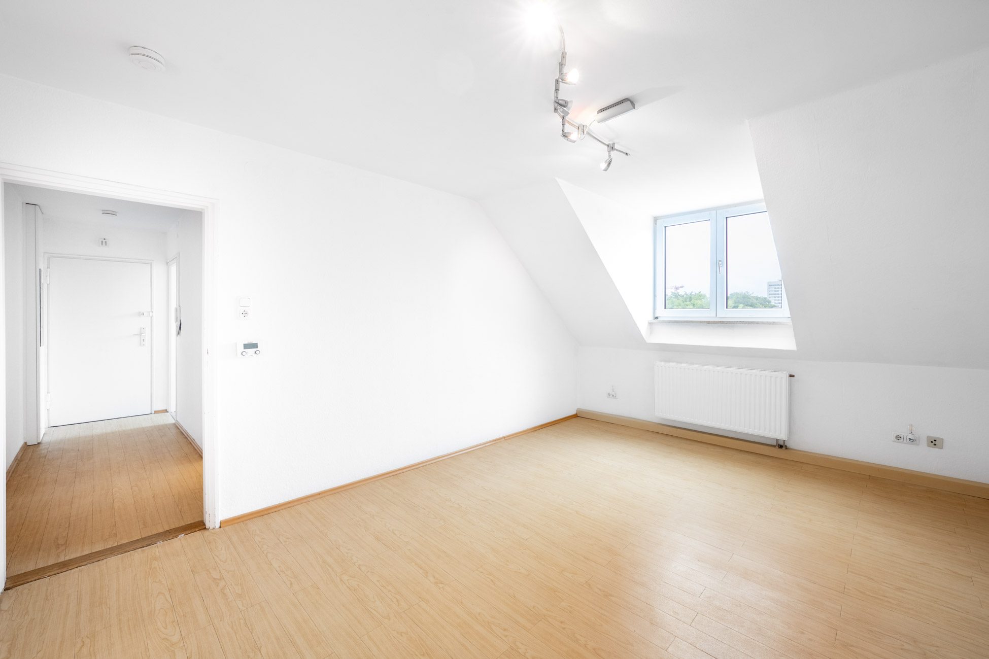 Aigner Immobilien GmbH - Immobilienangebot - 80804 München - Schwabing-West - Dachgeschosswohnung - Attraktive Dachgeschosswohnung mit Blick über die Dächer Schwabings