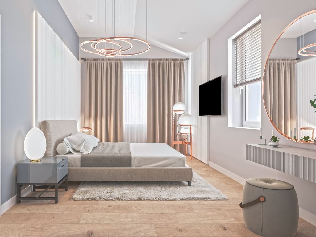Modern eingerichtetes Schlafzimmer im Neubau Trudering mit gemütlichem Bett, Nachttisch, großem Rundspiegel und eleganter Beleuchtung