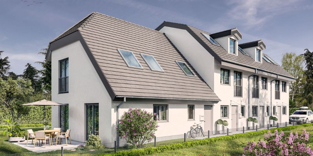 Modernes Münchner Reihenhaus mit heller Fassade, Dachgauben, Terrasse und gepflegtem Garten in ruhiger Wohnlage
