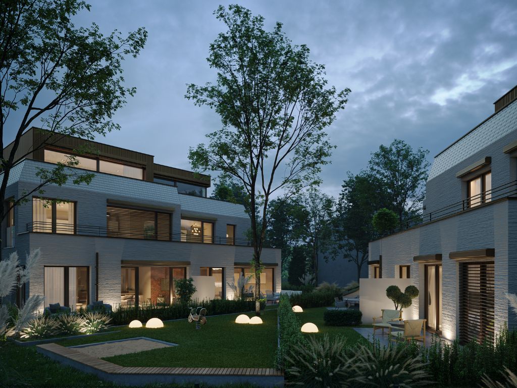 Abendliche Außenansicht moderner Neubauimmobilien in München mit gepflegter Gartenanlage, Terrassen und stimmungsvoller Beleuchtung