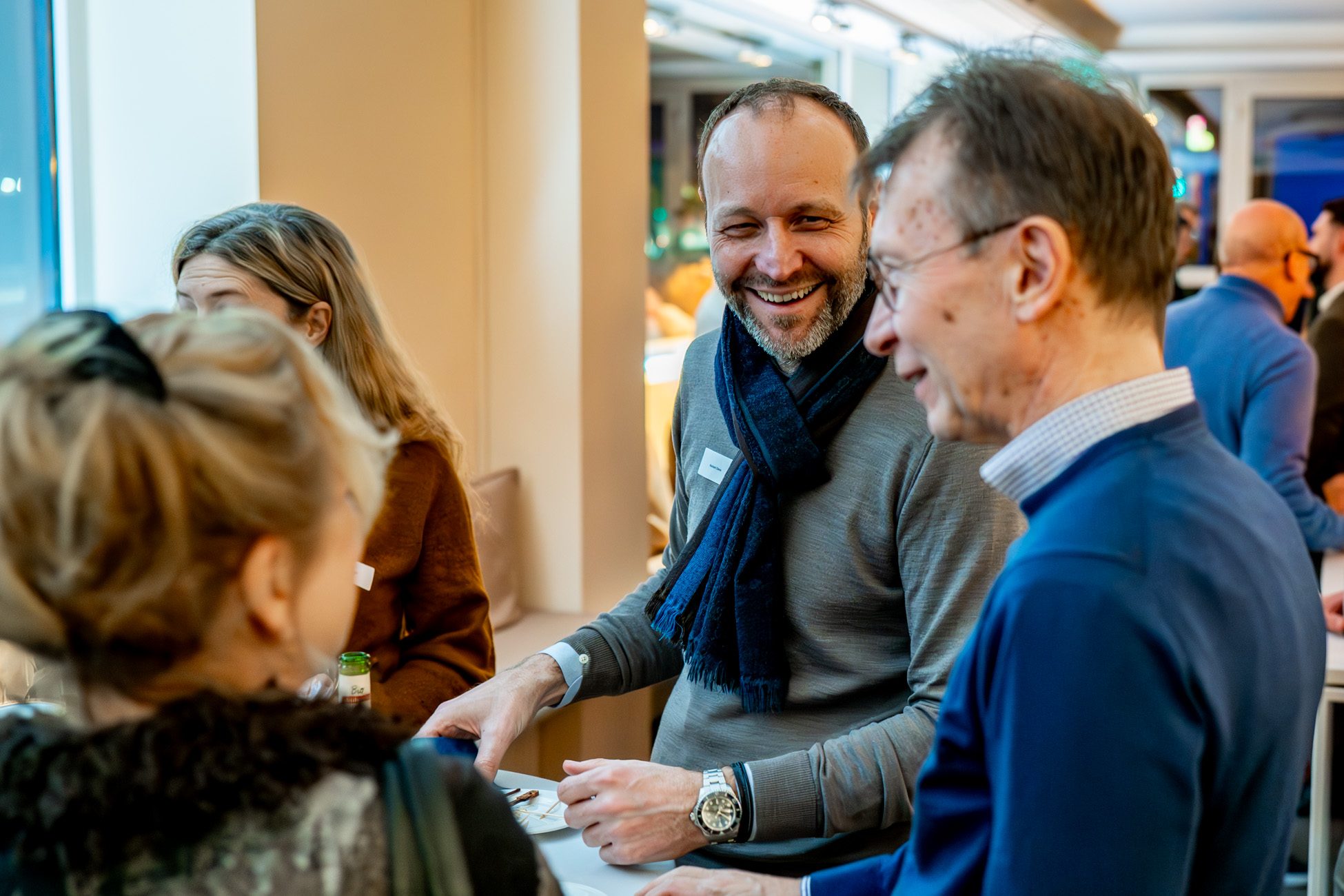 Fröhlicher Austausch beim Neujahrs-Aperitif 2026 von Aigner Immobilien