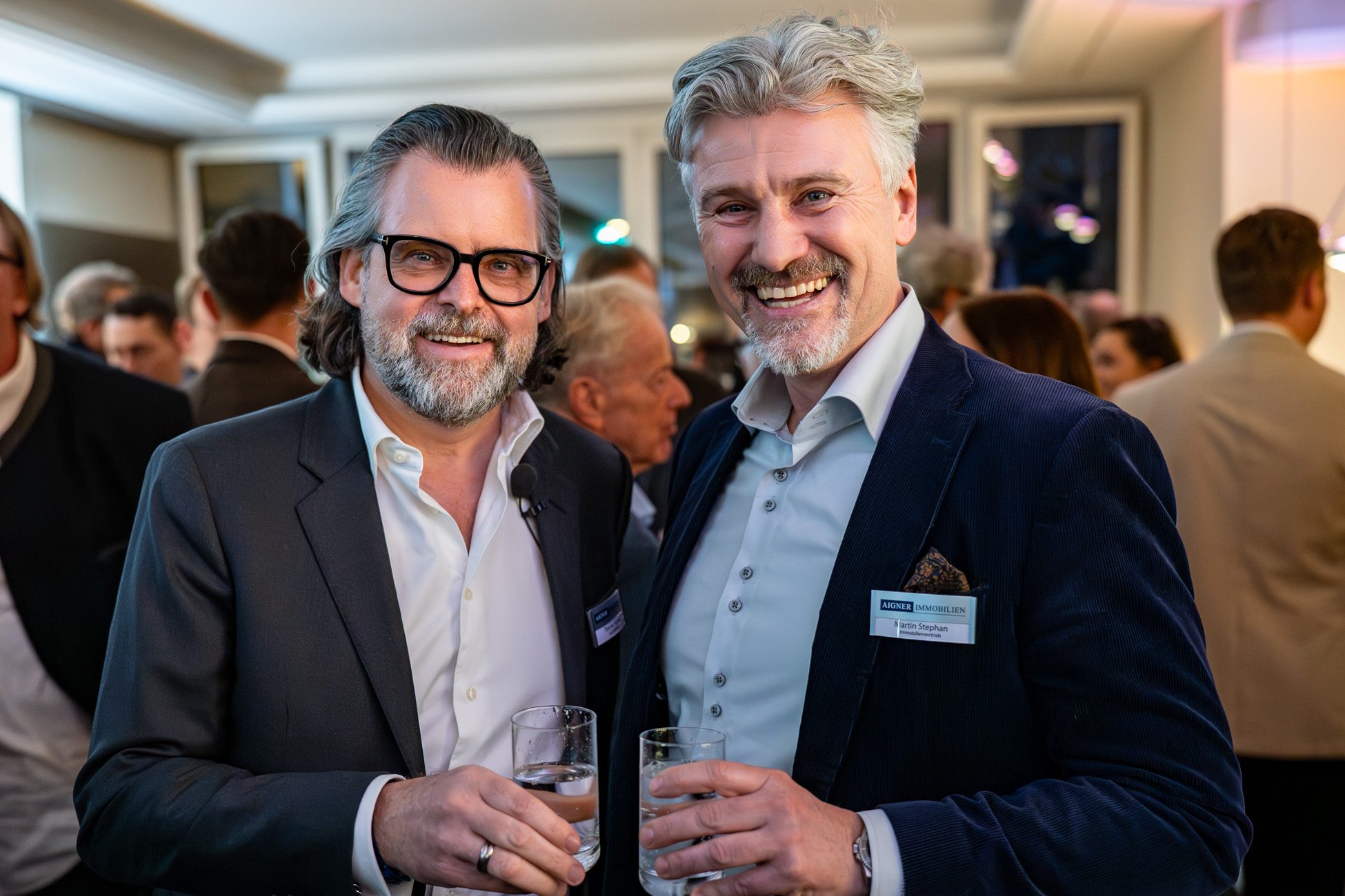 Thomas Aigner und Martin Stephan lächeln in die Kamera