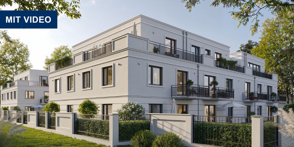 Moderne Stadtvilla in München mit hochwertiger Fassade, großen Balkonen und gepflegtem Vorgarten – exklusiver Neubau im Grünen