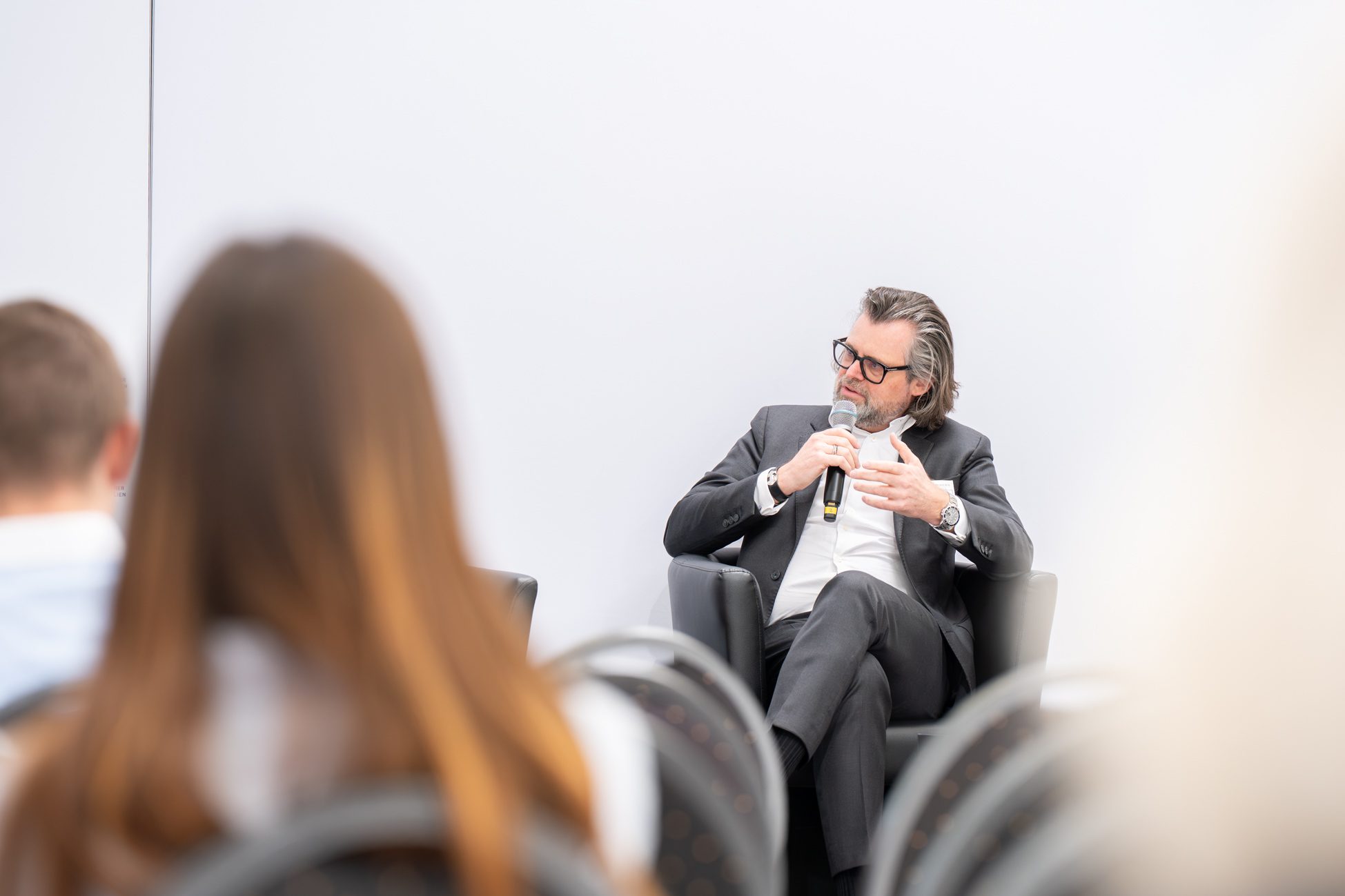 Thomas Aigner auf der Münchner Immobilien Messe bei einer Podiumsdiskussion
