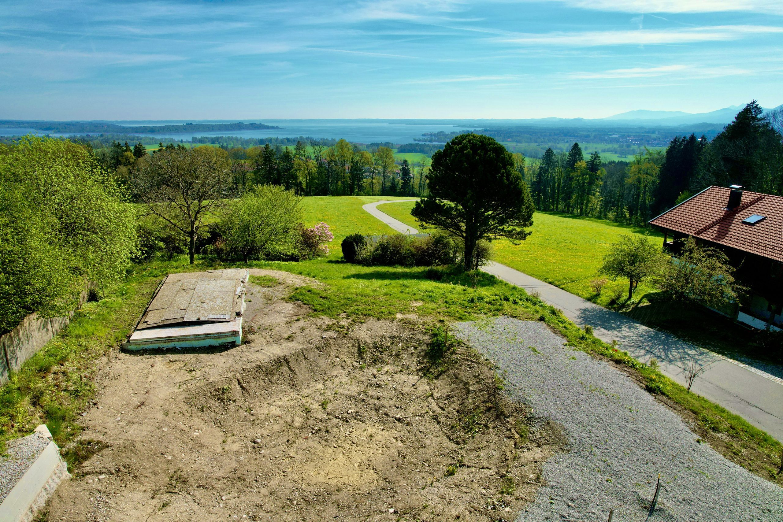 Aigner Immobilien GmbH - Immobilienangebot - 83233 Bernau am Chiemsee - Bernau a.Chiemsee - Baugrund für Ein- / Zweifamilienhäuser - Wohnen mit Weitblick: Grundstück in Bernau mit Blick auf den Chiemsee