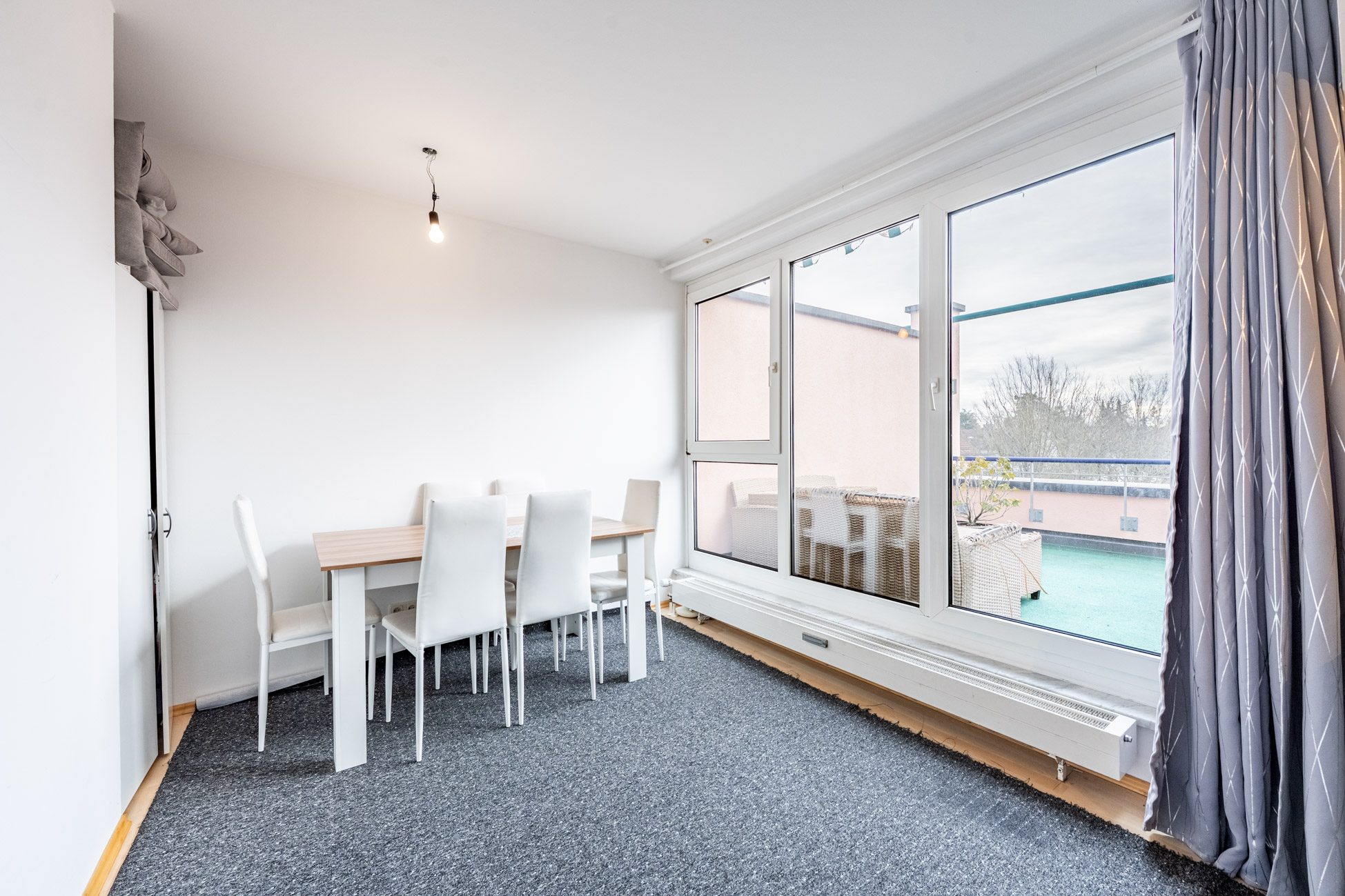 Aigner Immobilien GmbH - Immobilienangebot - 81375 München - Großhadern - Dachgeschosswohnung - Charmante 3-Zimmer-Dachgeschosswohnung mit Südterrasse