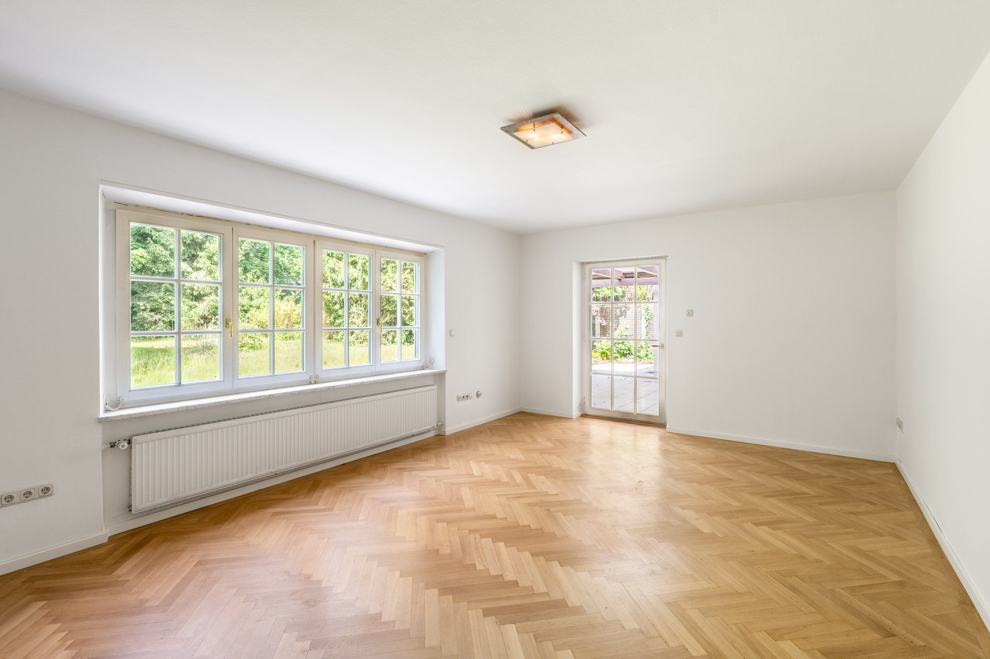 006LangWohnbereich Aigner Immobilien GmbH - Immobilienangebot - 82166 Gräfelfing - Gräfelfing - Einfamilienhaus - Begehrte Villenlage: Anwesen mit 1.275 m² Grundstück, Privatsphäre und Potenzial