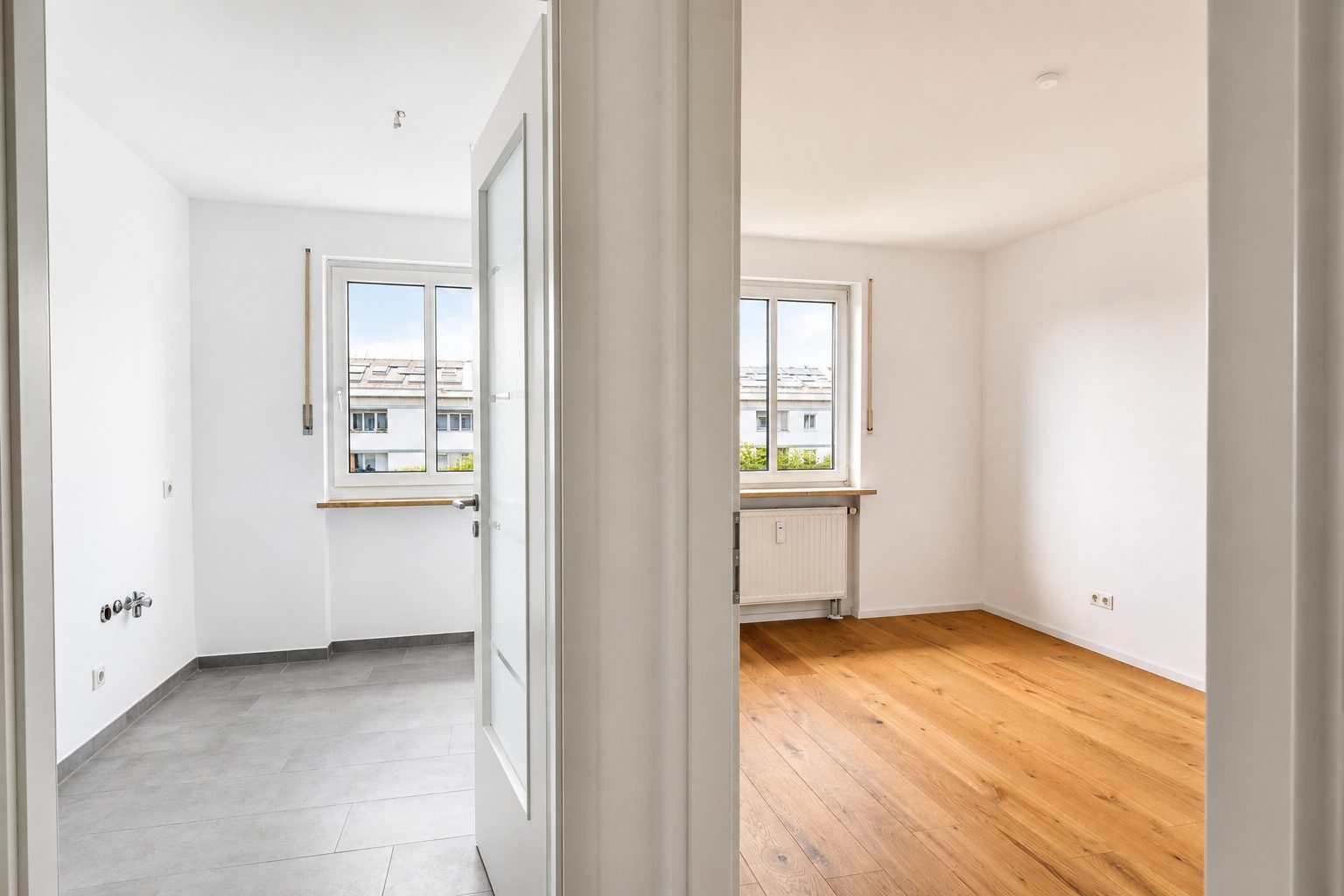 Aigner Immobilien GmbH - Immobilienangebot - 80637 München - Neuhausen - Maisonettewohnung - Modernes Wohnen auf zwei Etagen: Helle 4-Zimmer-Maisonettewohnung mit Südost-Balkon