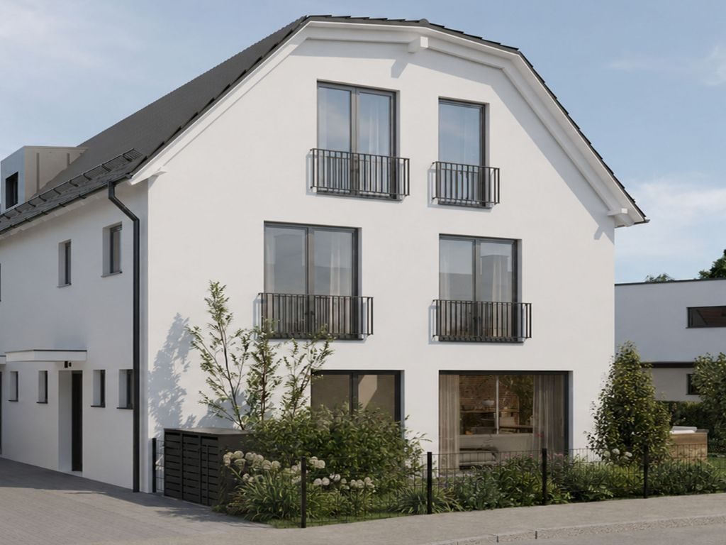 Modernes Mehrfamilienhaus mit großzügiger Terrasse und Garten in München - Nordwest Ansicht