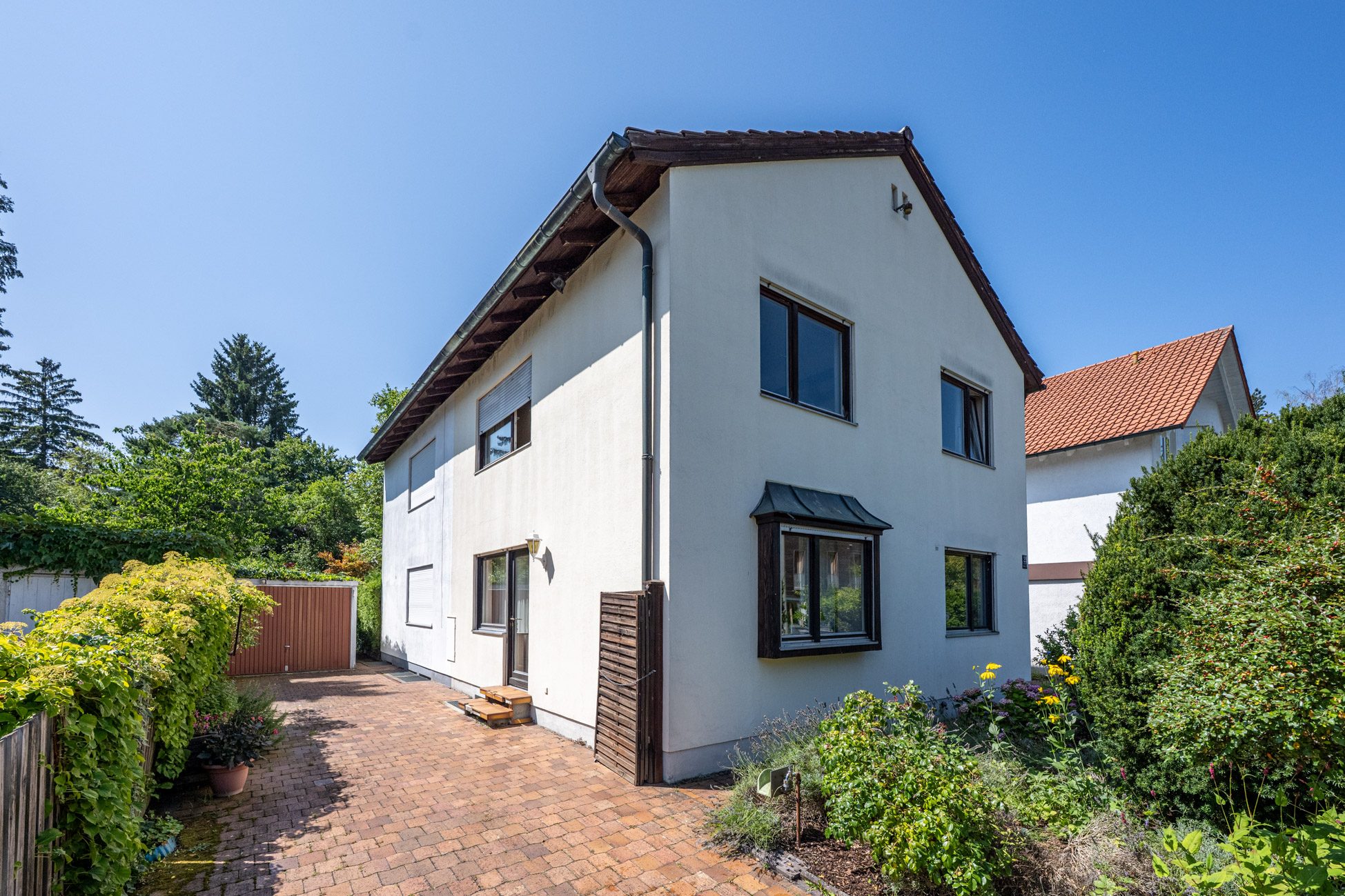Aigner Immobilien GmbH - Immobilienangebot - 81477 München - Solln - Doppelhaushälfte - Ruhige Doppelhaushälfte mit Ausbau-Potenzial und idyllischen Süd-West-Garten