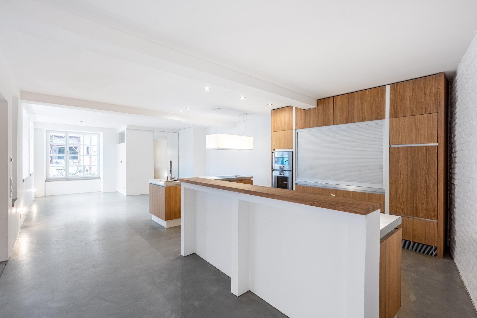 Aigner Immobilien GmbH - Immobilienangebot - 80469 München - Zentrum-Altstadt - Erdgeschosswohnung - Einzigartiges Gartenloft im Glockenbachviertel – modernes Wohnkonzept auf zwei Ebenen