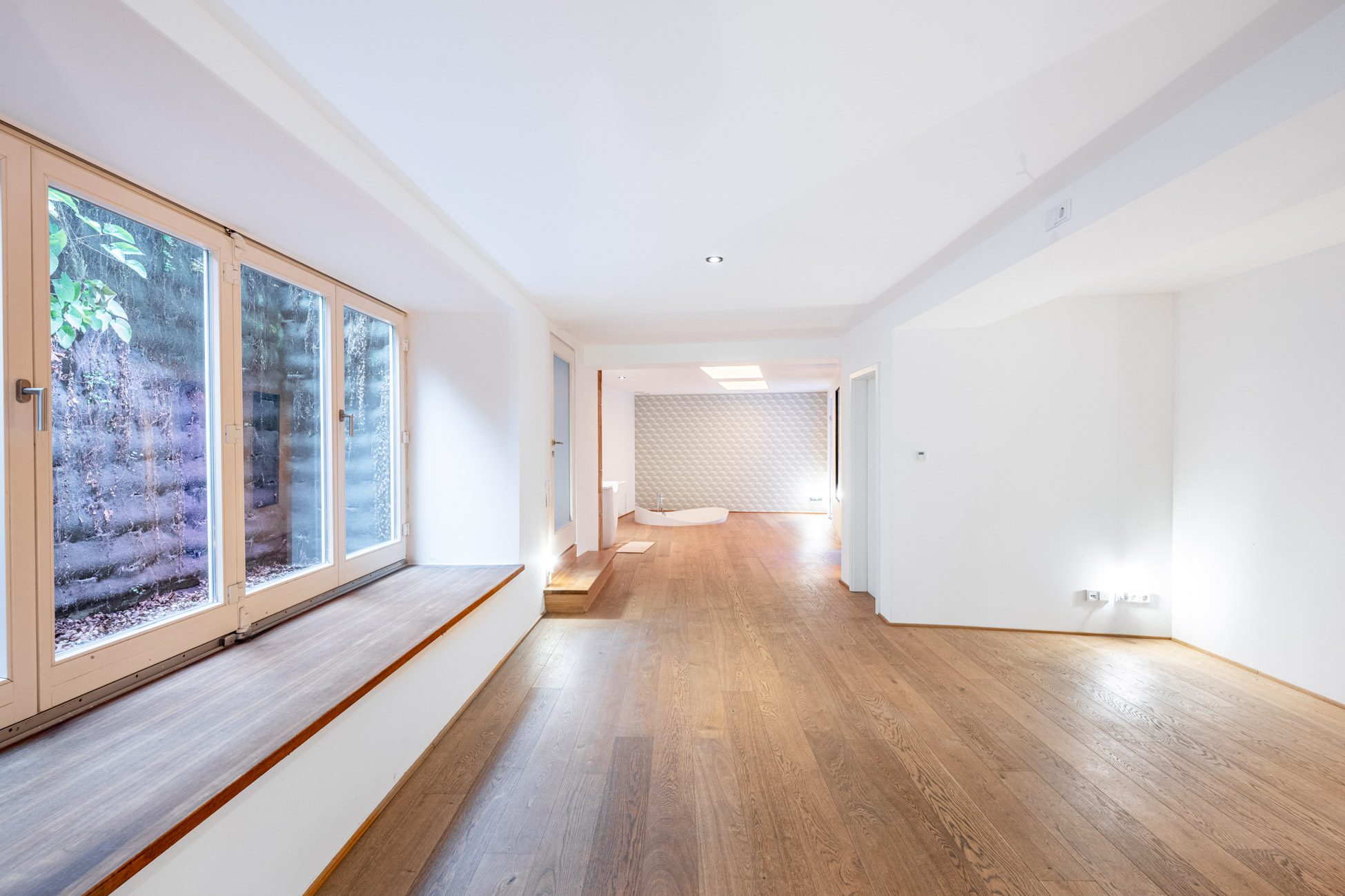 Aigner Immobilien GmbH - Immobilienangebot - 80469 München - Zentrum-Altstadt - Erdgeschosswohnung - Einzigartiges Gartenloft im Glockenbachviertel – modernes Wohnkonzept auf zwei Ebenen