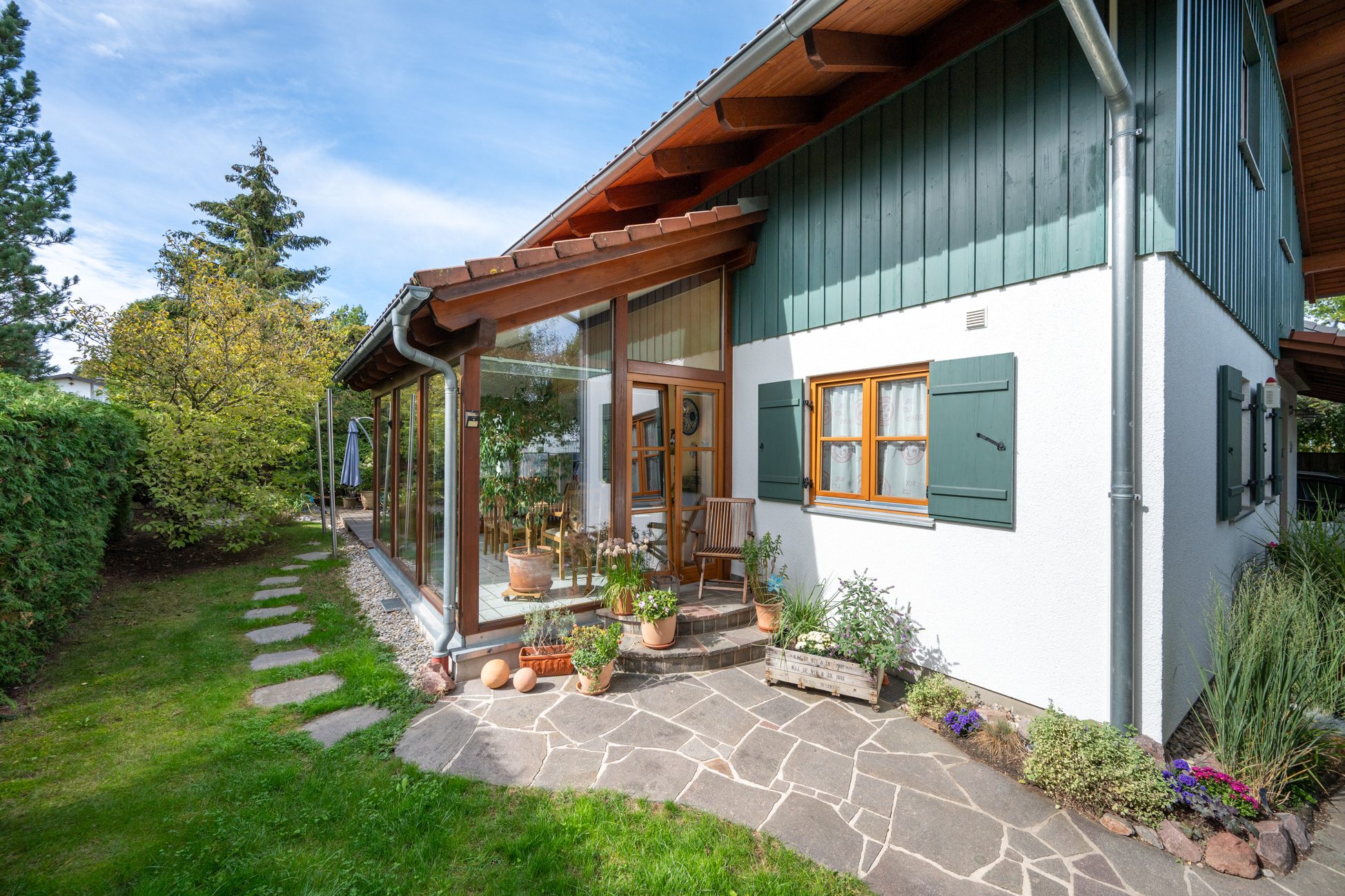 Aigner Immobilien GmbH - Immobilienangebot - 82024 Taufkirchen - Taufkirchen (LK München Süd) - Einfamilienhaus - Modernes Einfamilienhaus mit idyllischer Gartenoase und ernergieeffizienter Ausstattung