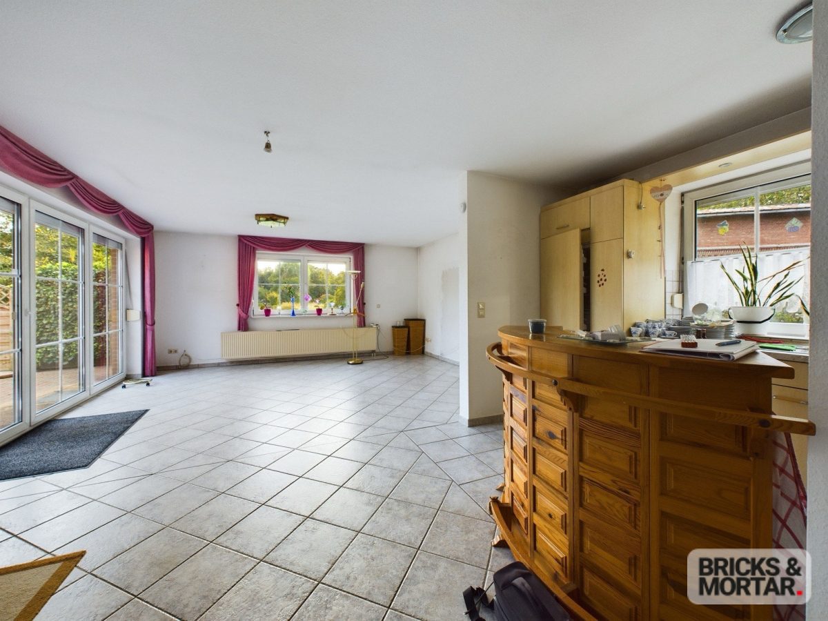 Immobilienangebot - Böel - Alle - Gepflegter Winkelbungalow auf sonnigem großen Grundstück