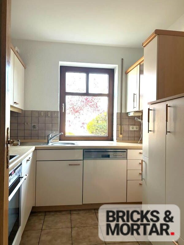 Immobilienangebot - Untermeitingen - Alle - Charmante 3-Zimmer-Wohnung mit Wintergarten und Gartenanteil, ruhige Lage, TG-Stellplatz vorhanden