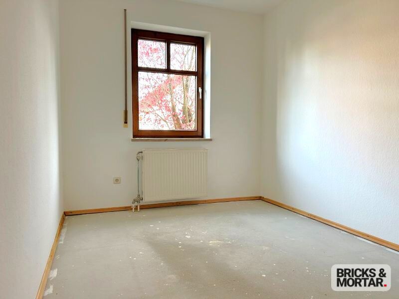 Immobilienangebot - Untermeitingen - Alle - Charmante 3-Zimmer-Wohnung mit Wintergarten und Gartenanteil, ruhige Lage, TG-Stellplatz vorhanden