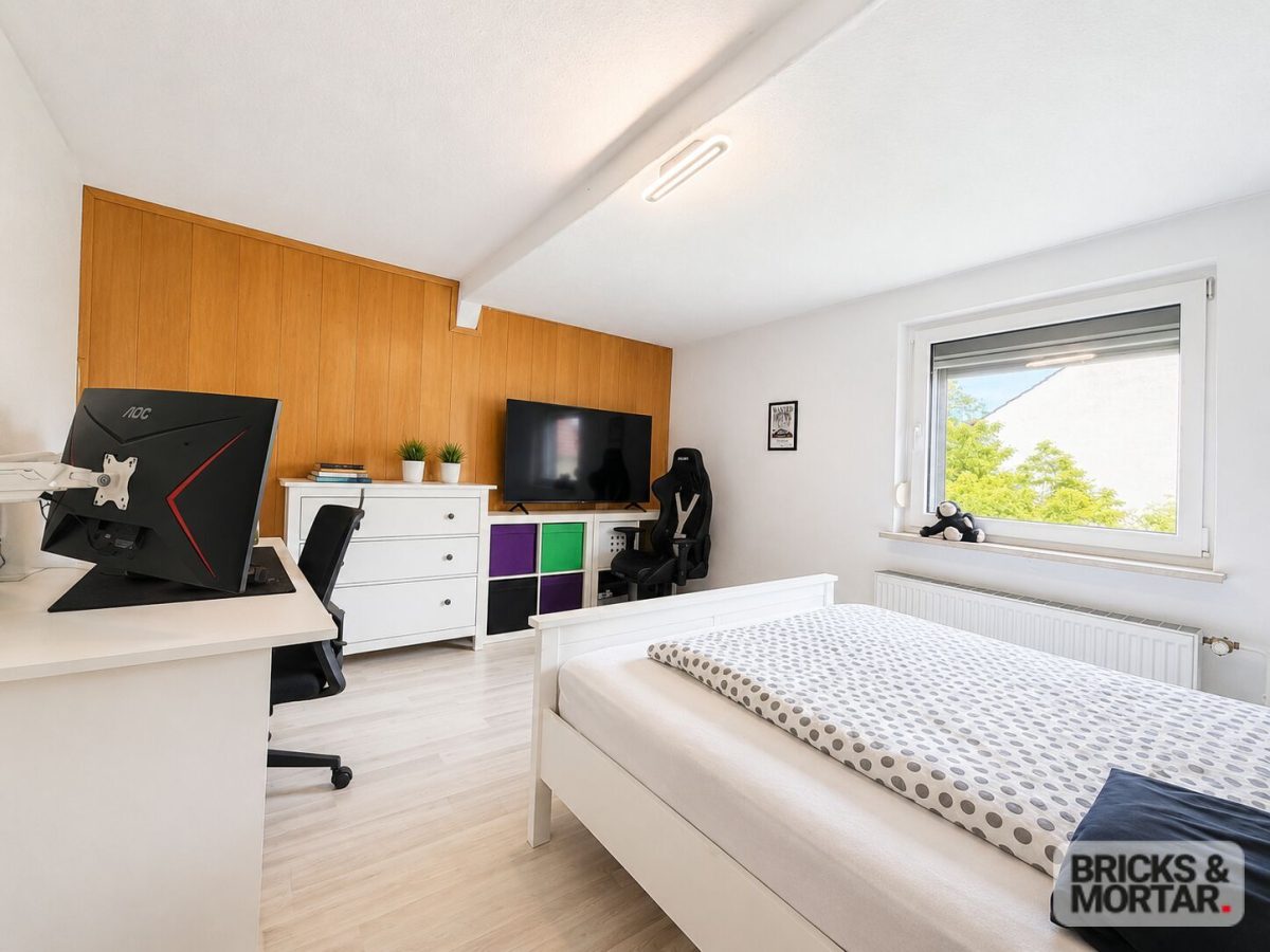 Immobilienangebot - Lohfelden - Alle - Familienfreundliche Doppelhaushälfte in Lohfelden mit Garten, Terrasse und viel Stauraum