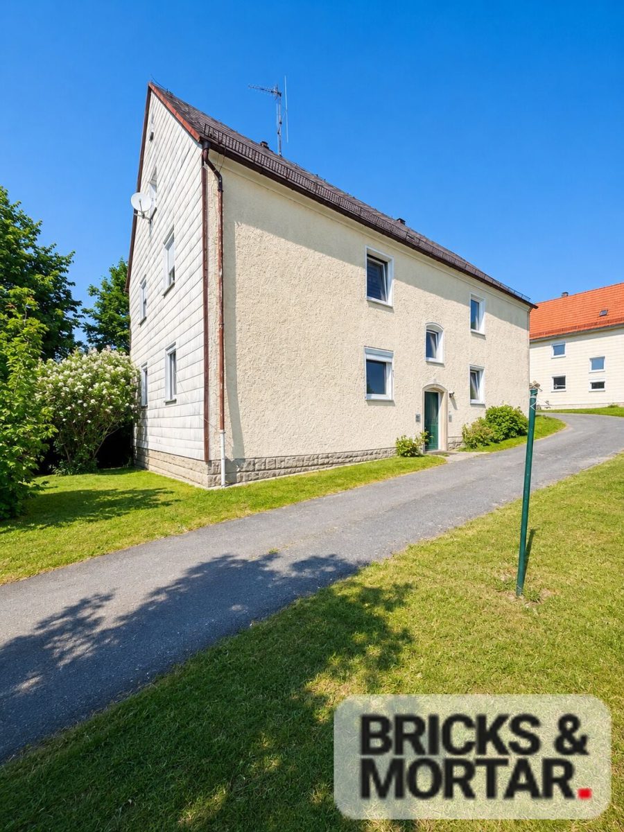Immobilienangebot - Brand - Alle - Kapitalanlage mit Entwicklungspotenzial – Zwei Mehrfamilienhäuser auf großem Grundstück in Brand