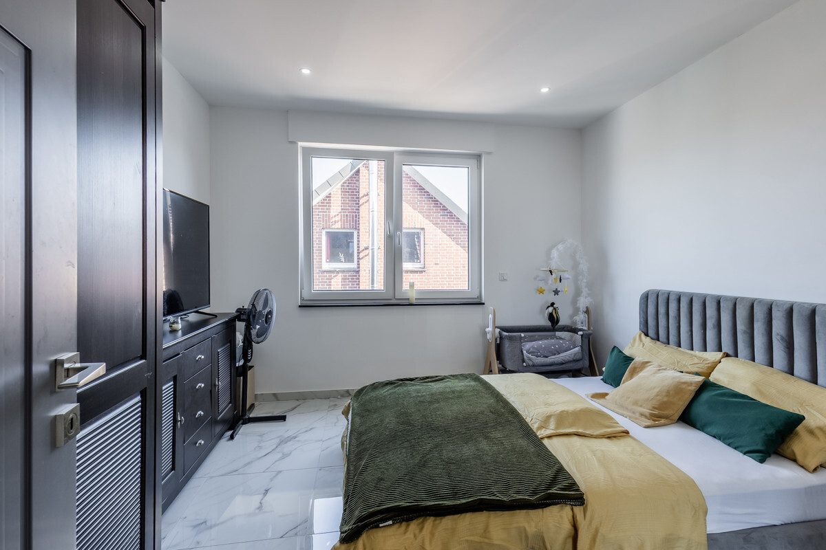 Immobilienangebot - Beckum - Wohnen & Gewerbe - Paketverkauf: Zwei neuwertige Wohnungen!