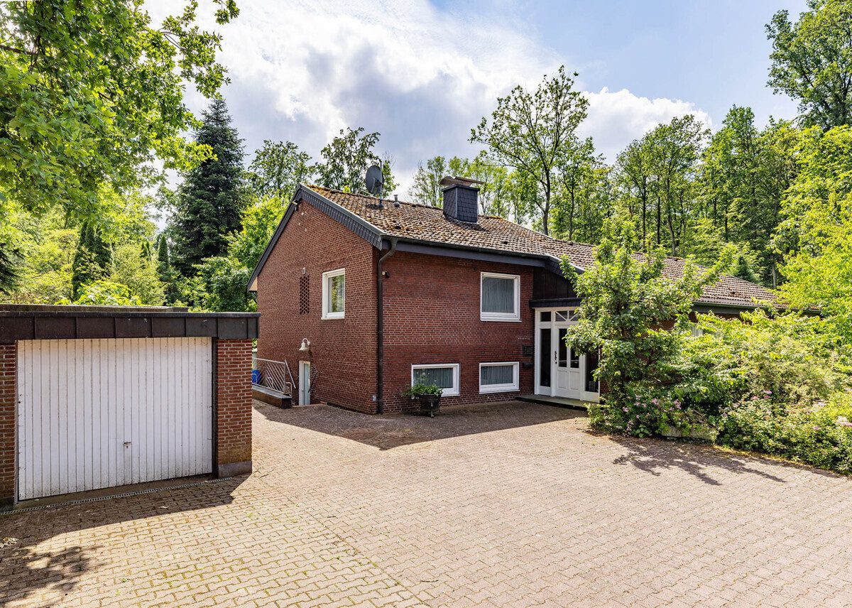 Vorderansicht Immobilienangebot - Münster - Wohnen & Gewerbe - Einfamilienhaus mit herrenhäuslichem Flair in begehrter Waldrandlage!