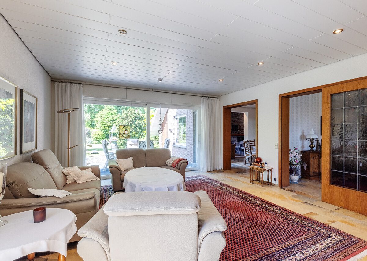 Wohnzimmer Immobilienangebot - Beckum / Neubeckum - Wohnen & Gewerbe - Familienglück im Grünen: Ihre Wohlfühloase in bester Wohnlage von Neubeckum!
