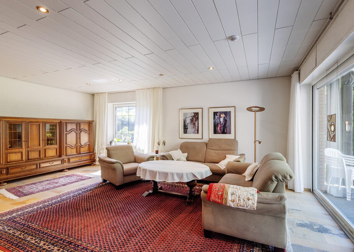 Wohnzimmer Immobilienangebot - Beckum / Neubeckum - Wohnen & Gewerbe - Familienglück im Grünen: Ihre Wohlfühloase in bester Wohnlage von Neubeckum!