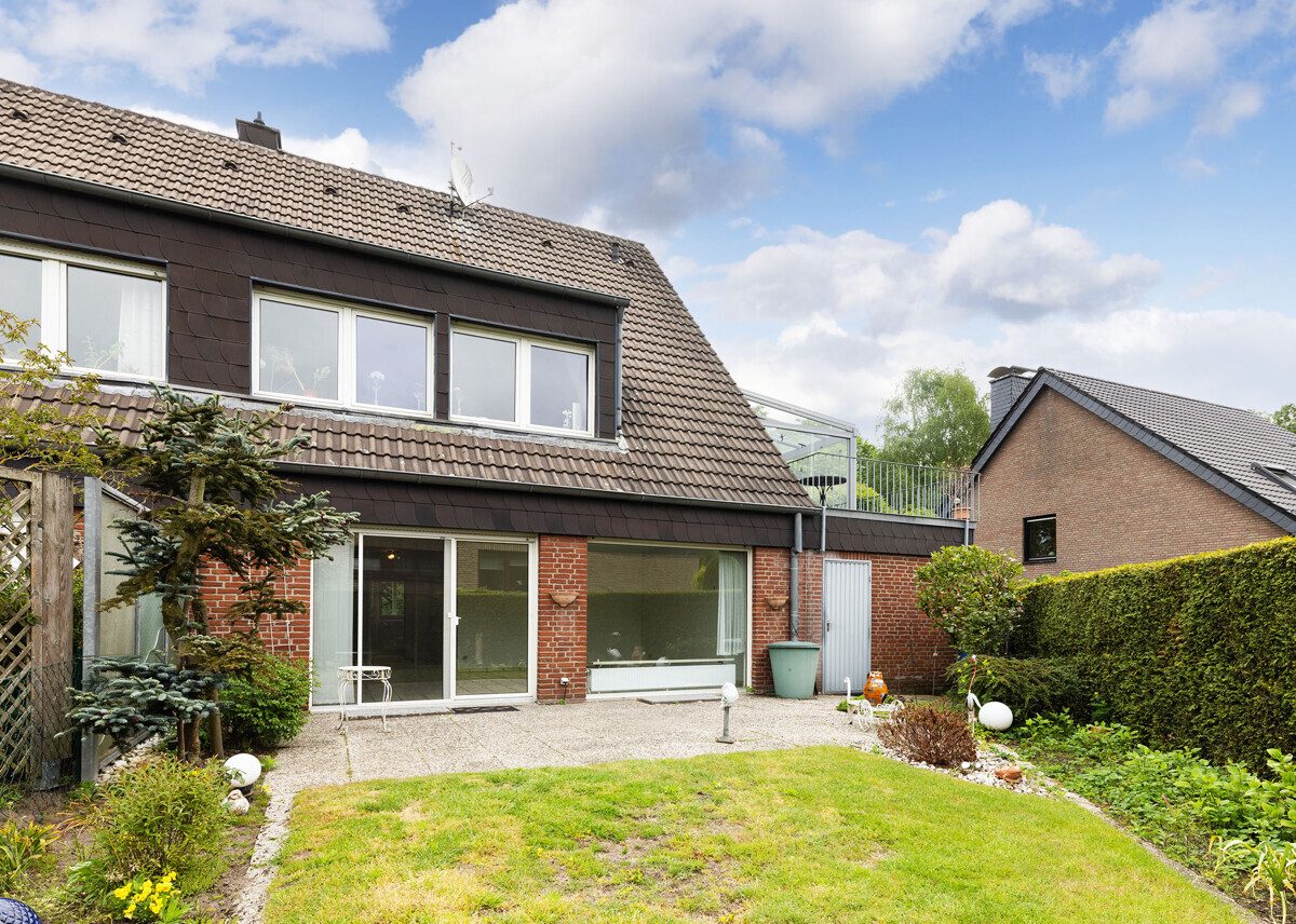 Rückansicht Immobilienangebot - Munster - Wohnen & Gewerbe - Erdgeschosswohnung mit eigenem Garten!
