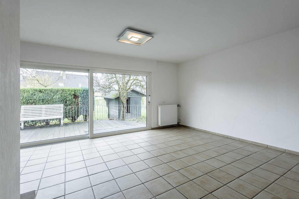 Wohnzimmer im Erdgeschoss Immobilienangebot - Oelde - Wohnen & Gewerbe - Ein Haus mit vielen Möglichkeiten!