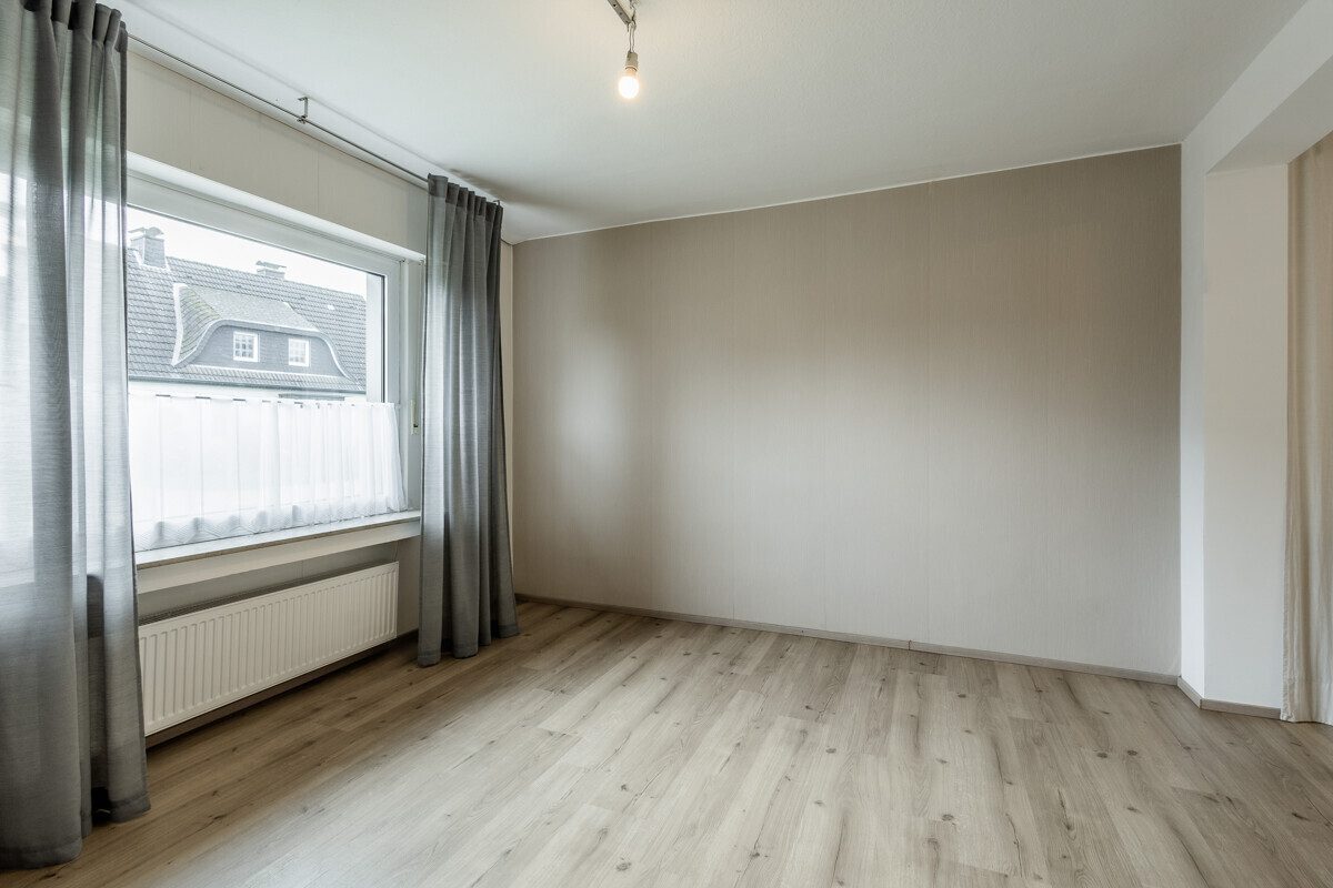 Wohnbereich im Erdgeschoss Immobilienangebot - Oelde - Wohnen & Gewerbe - Ein Haus mit vielen Möglichkeiten!