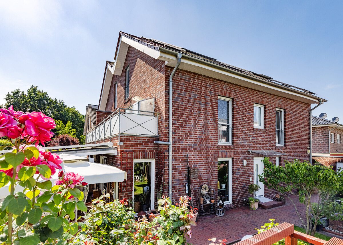 Rückansicht Immobilienangebot - Münster - Wohnen & Gewerbe - Gepflegte Doppelhaushälfte mit viel Platz für Ihren Wohntraum!