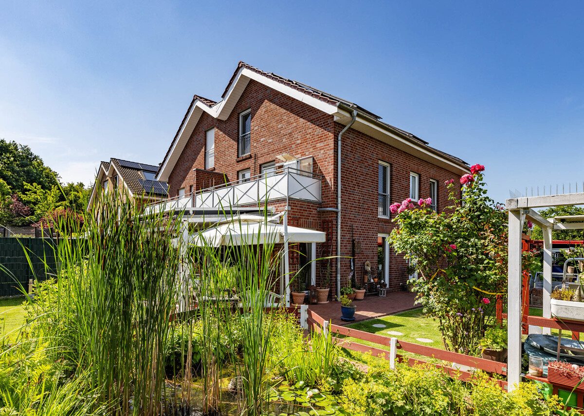Rückansicht Immobilienangebot - Münster - Wohnen & Gewerbe - Gepflegte Doppelhaushälfte mit viel Platz für Ihren Wohntraum!